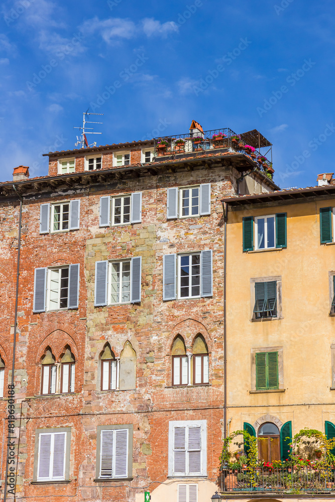 Old houses on the San Michele square in Lucca, Italy