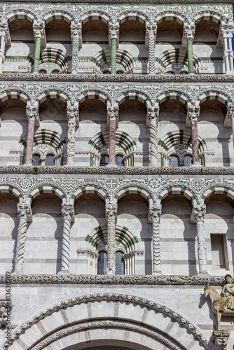 Front facade of the historic Duomo cathedral in Lucca, Italy