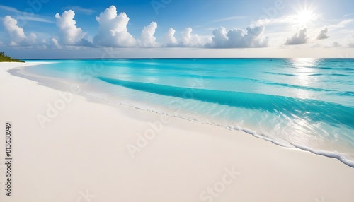 A white sand beach under a bright blue sky with fluffy clouds  surrounded by clear blue water