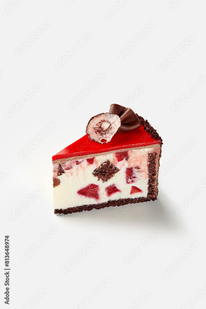 Slice of chocolate sponge cake with creamy cherry filling Slice of chocolate sponge cake with creamy cherry filling
