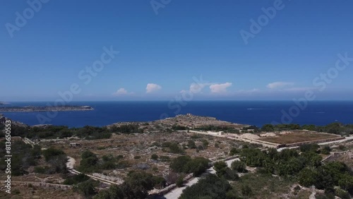 Selmun peninsula, distance view of Ghajn Hadid Tower De Redin Tower from the Selmun palace. Mediterranean sea in the back. High quality 4k footage photo