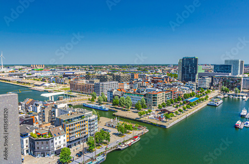 Antwerp cityscape, aerial panoramic view of Antwerp city Eilandje quarter neighborhood with port area, water canals, Bonaparte Dock, skyline horizon panorama of Antwerpen, Flemish Region, Belgium