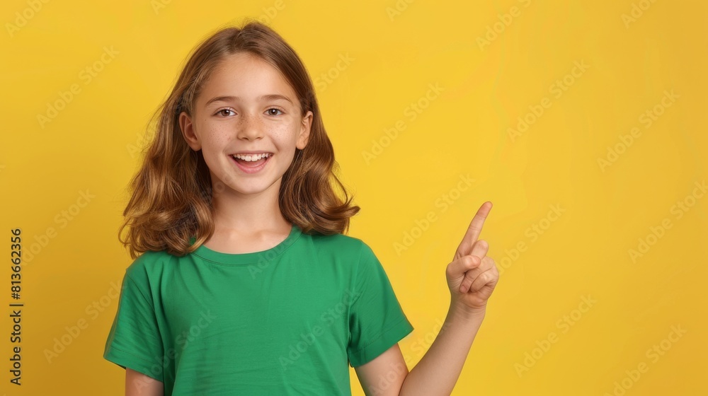 Smiling girl pointing up Smiling girl pointing up
