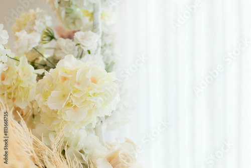 Universal composition made of beautiful bouquet of flowers on light backdrop. Floral decoration. Natural floral border for the background	