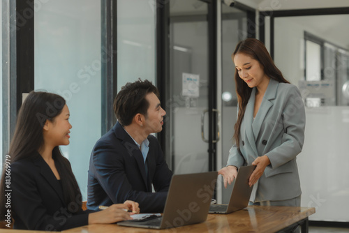 employees are discussing and exchange their idea to solve some miner problem, group of entrepreneurs is planning strategy to increase their income in the office, happy working