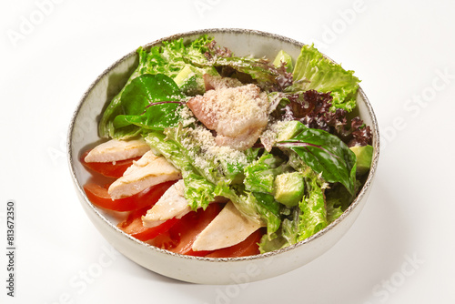 Chicken salad with fresh greens, tomato, vocado and Parmesan photo