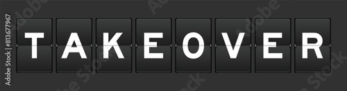 Black color analog flip board with word takeover on gray background