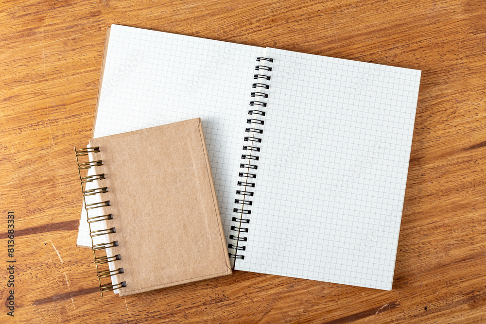 note book on wooden background note book on wooden background