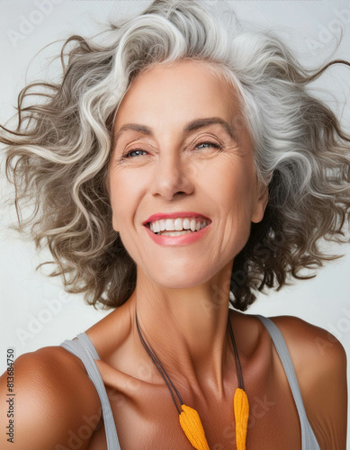Portrait of a middle-aged woman with grey hair, AI-generated. photo