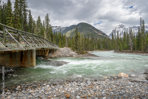 Old wooden bridge at the confluence of the Kicking Horse and Amiskwi Rivers in Yoho National Park, British Columbia, Canada