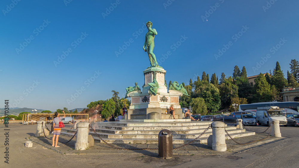 Fototapeta premium Bronze copy of the statue of David by Michelangelo at Piazzale Michelangelo timelapse hyperlapse in Florence