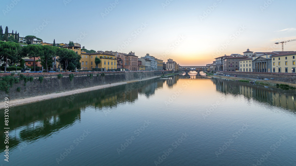 River Arno and famous bridge Ponte Vecchio day to night timelapse after sunset in Florence, Tuscany, Italy River Arno and famous bridge Ponte Vecchio day to night timelapse after sunset in Florence, Tuscany, Italy