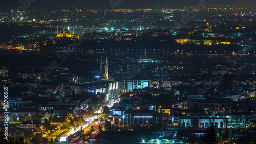 Istanbul classical night skyline scenery timelapse, view over Bosporus channel. photo