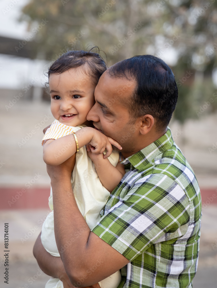 young father and toddler son cute moments at outdoor at evening young father and toddler son cute moments at outdoor at evening