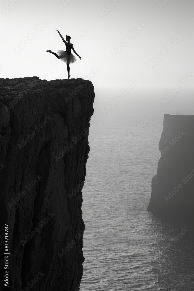 poised silhouette of a ballet dancer, perfectly balanced on the edge of a cliff overlooking a vast ocean. The simplicity of the composition emphasizes the strength and grace of the subject, minimalist