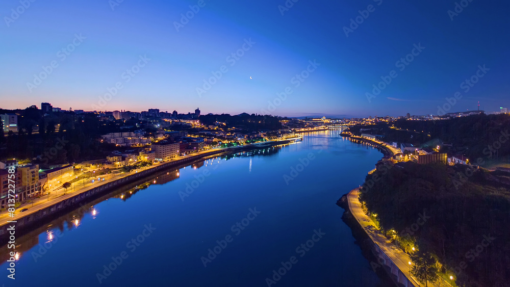 Fototapeta premium Aerial view before sunrise at the most emblematic area of Douro river timelapse.