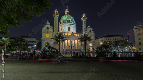 Karlskirche on the Karlsplatz square night timelapse hyperlapse in Vienna, Austria. photo