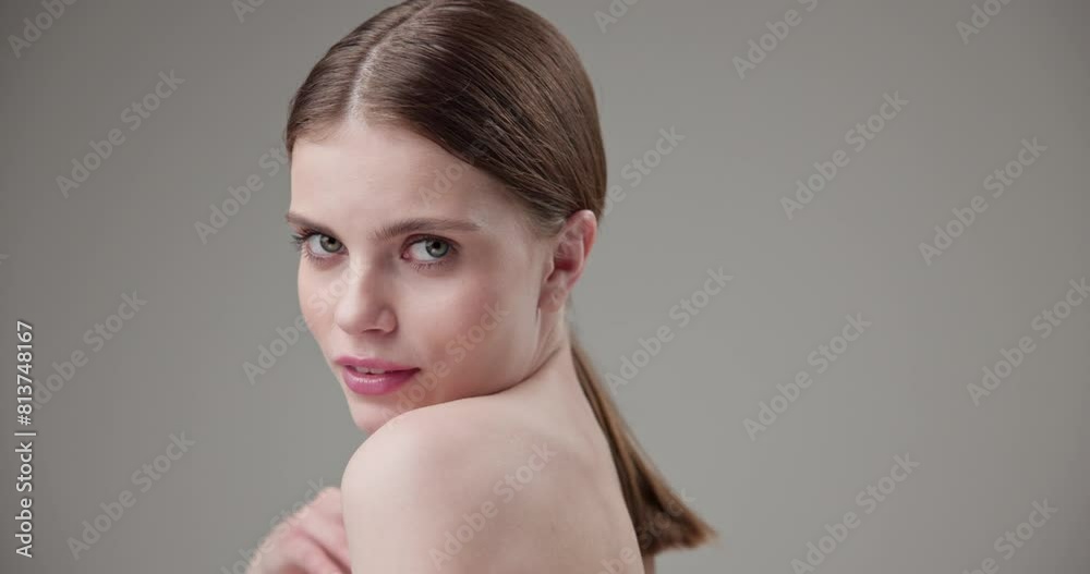 Beauty, health, cosmetics, anti-aging therapy and skin care concept - young beautiful brunette Caucasian woman posing and looking at the camera with a calm confident look Beauty, health, cosmetics, anti-aging therapy and skin care concept - young beautiful brunette Caucasian woman posing and looking at the camera with a calm confident look