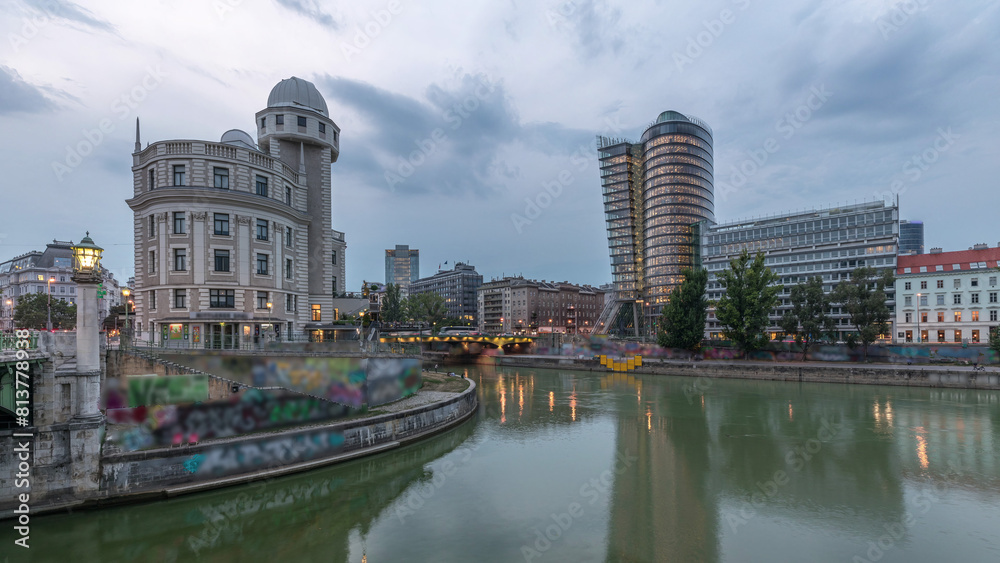 Obraz premium Urania and Danube Canal day to night timelapse in Vienna.