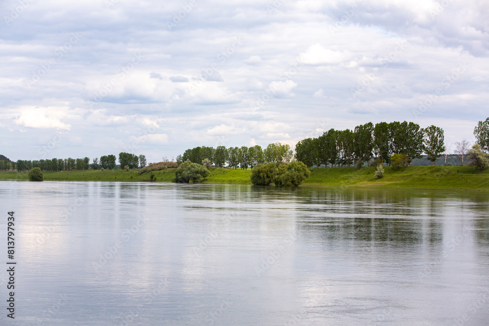 Beautiful summer landscape with green trees, green meadows on the bank of the river in Republic of Moldova. Beautiful summer landscape with green trees, green meadows on the bank of the river in Republic of Moldova.