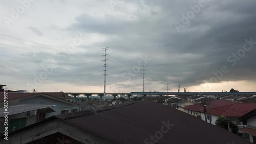 Scenic view of dark thunderstorm cloudscape over Kuala Lumpur Malaysia urban city.