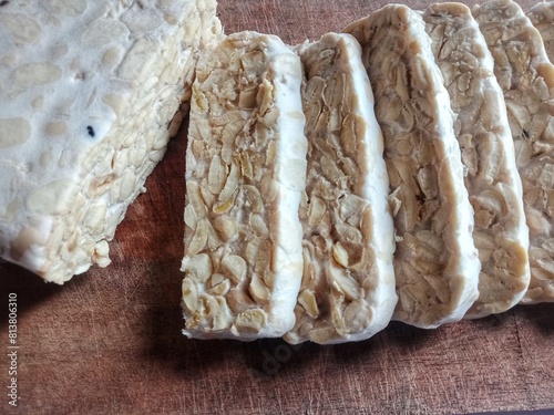 Photos Tempeh or tempeh on the wooden plate