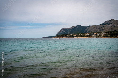 Rocky beach in the Victoria town in Mallorca Spain on a cloudy summer day