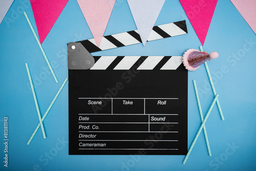 Clapper board and birthday decorations, action scene, movie production, screen clap