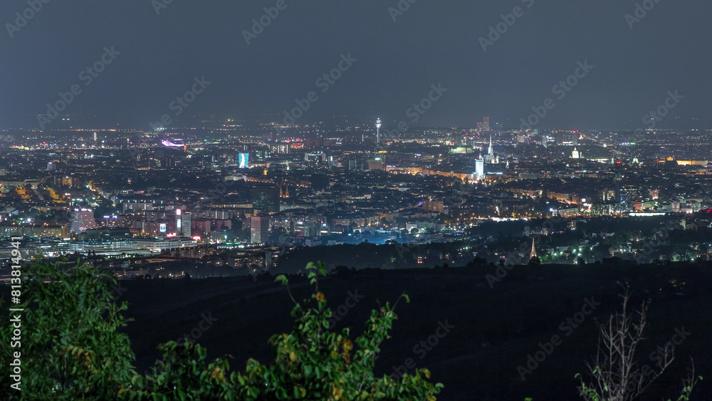 Obraz premium Skyline of Vienna from Danube Viewpoint Leopoldsberg aerial night timelapse.