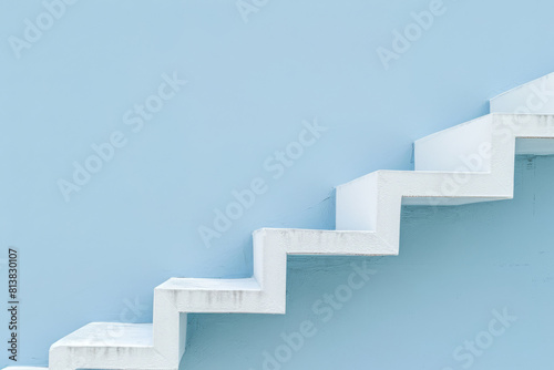 Minimalistic White Staircase Against a Pale Blue Background