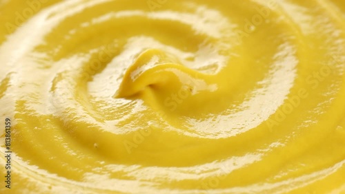 Zoom frame mustard sauce in plate. Most popular sauce mustard for sausages, steak, salad