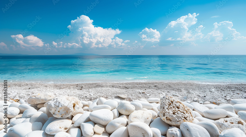 White stones on sand with the sea horizon White stones on sand with the sea horizon
