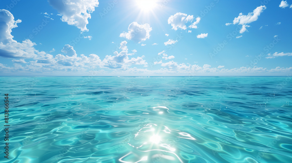 Crystal clear turquoise sea blending with a bright blue sky