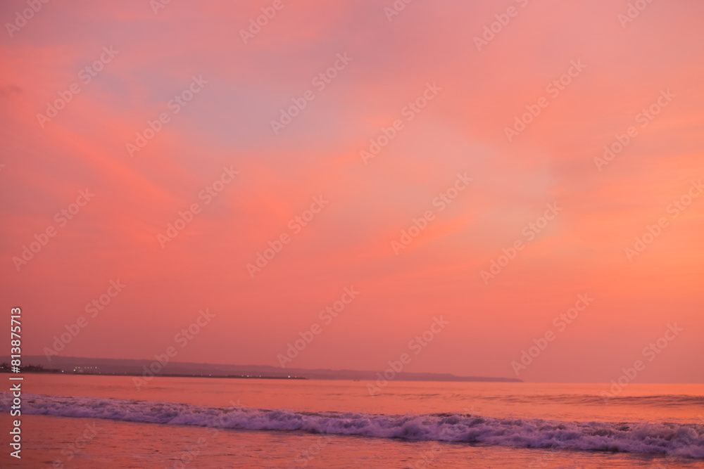 Beautiful peach sky at sunset over ocean