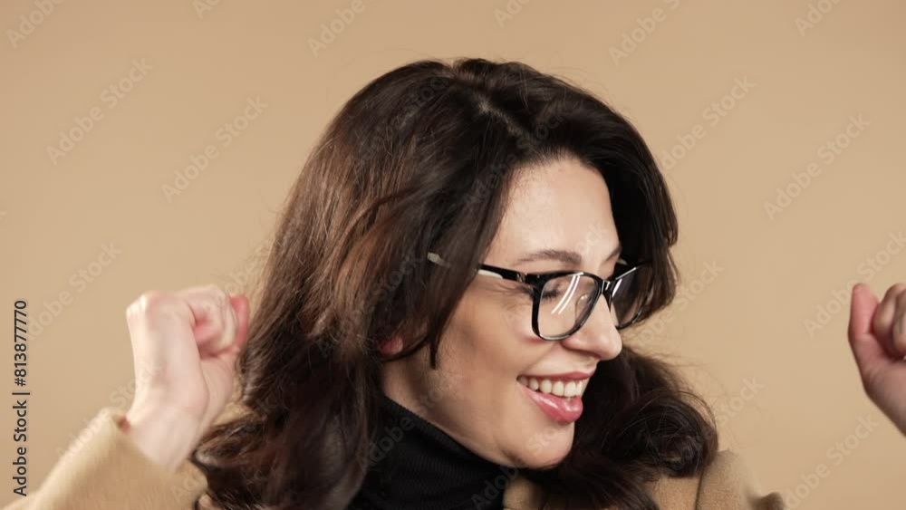 Mature woman shows triumph yes gesture of victory, she achieved result, Jackpot Mature woman shows triumph yes gesture of victory, she achieved result, Jackpot