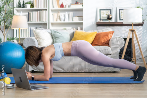 Portrait of sport slim fit strength asian woman training in sportswear relax and practicing yoga, fitness, exercise, wellness, workout, sport at home.Diet concept.Fitness and healthy lifestyle
