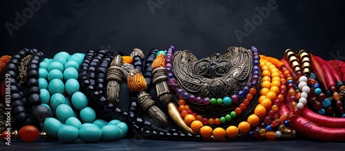 Copy space image featuring variously colored necklaces representing different orishas from the Yoruba religion photo