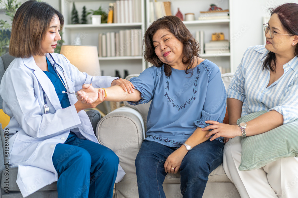 Obraz premium Female healthcare professional providing at home medical care to elderly woman with smile, senior patient, nursing, listens attentively to nurse, elderly care, home health services, patient at home