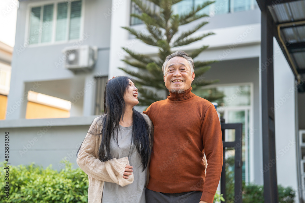 Naklejka premium Portrait of enjoy happy love asian family senior mature father and young daughter smiling play laughing and having fun together at home, care, elderly, insurance.happy family and Father Day concept