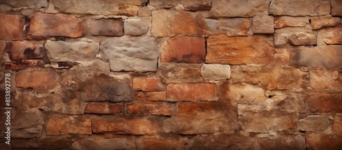 A textured background of an ancient brick wall in a medieval setting with plenty of copy space for images