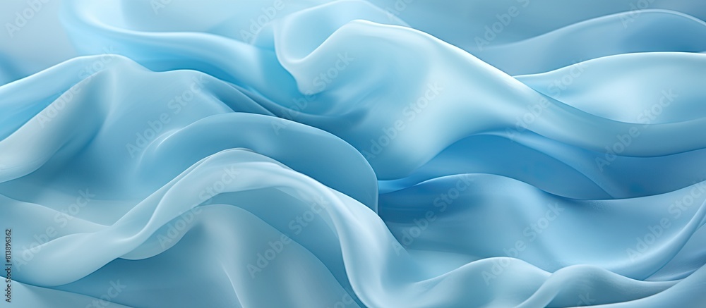 Obraz premium Close up image of a soft chiffon fabric with an abstract blue texture. Copy space image. Place for adding text and design
