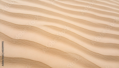 Sand pattern of a beach in the summer with wavy surface and details.