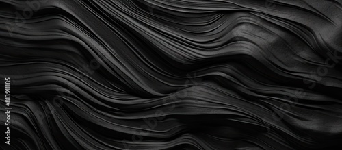 A wrinkled plastic surface on a black background serves as a high quality royalty free stock photo with realistic texture for overlay copy space and photo effects