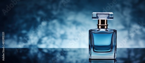 Product photography of a blue perfume bottle and its bottle cover showcasing the elegance of the eau de toilette with ample empty space for text or logos photo