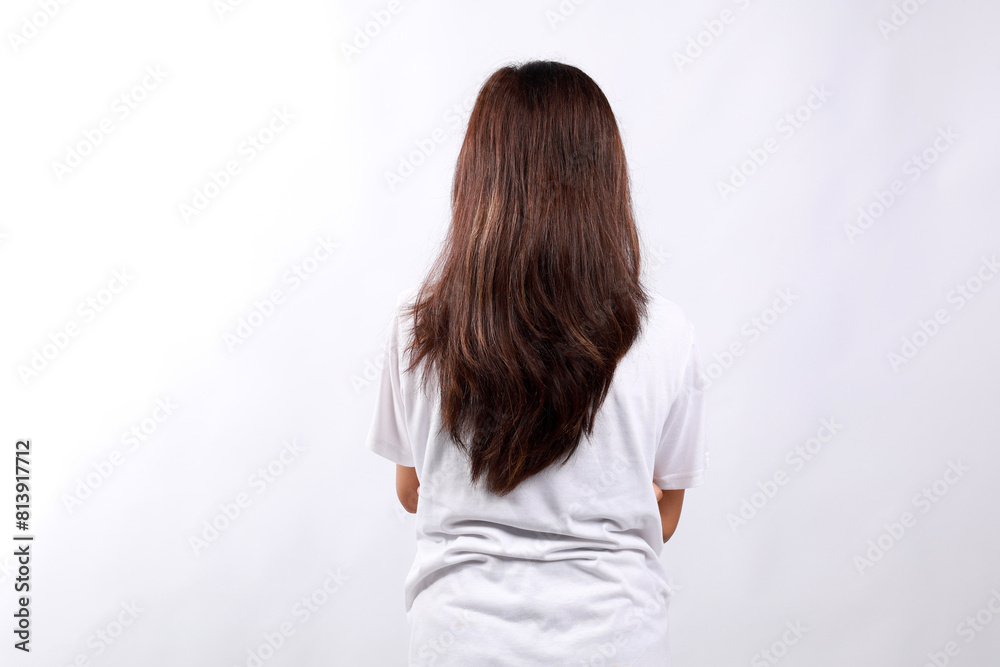Back view of asian woman in casual standing over isolated background, standing backwards Back view of asian woman in casual standing over isolated background, standing backwards