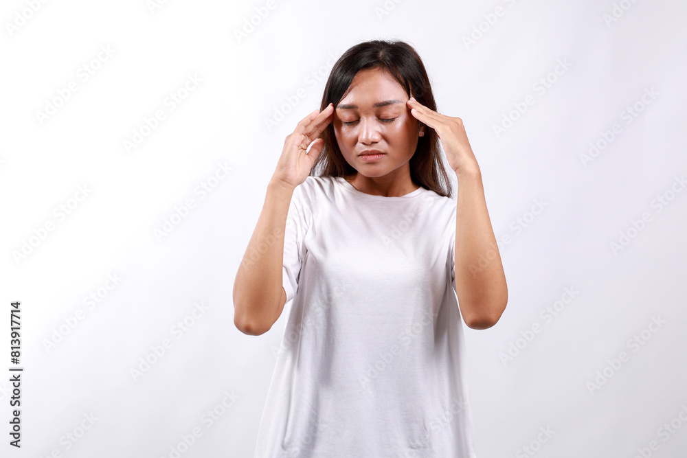 Portrait of asian woman feeling headache, migraine or being ill. Isolated on white background. Portrait of asian woman feeling headache, migraine or being ill. Isolated on white background.