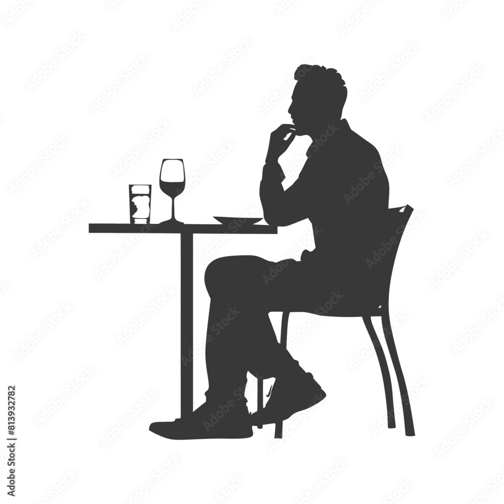 Silhouette man sitting at a table in the cafe black color only