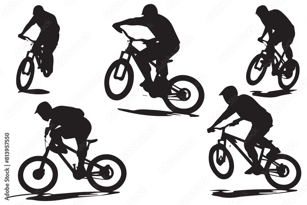 Silhouette of a cyclist jumping on a bicycle Silhouette of a cyclist jumping on a bicycle