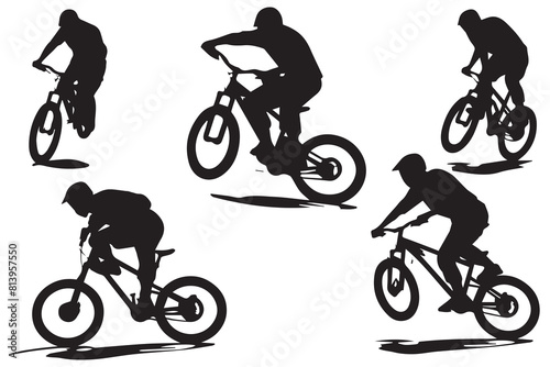 Silhouette of a cyclist jumping on a bicycle