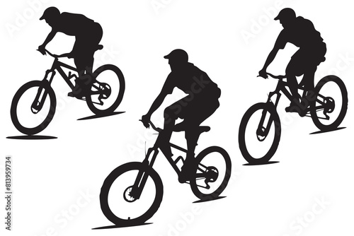 Silhouette of a cyclist jumping on a bicycle